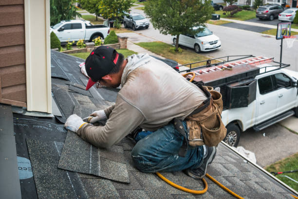Professional Roofing technician working in Pierpont, OH